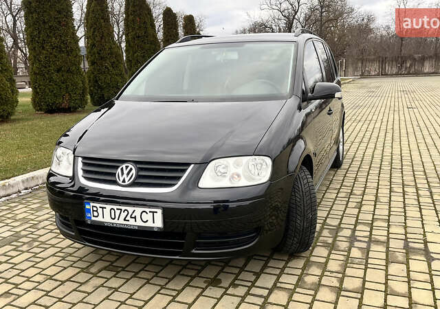 Чорний Фольксваген Туран, об'ємом двигуна 1.6 л та пробігом 222 тис. км за 7000 $, фото 1 на Automoto.ua