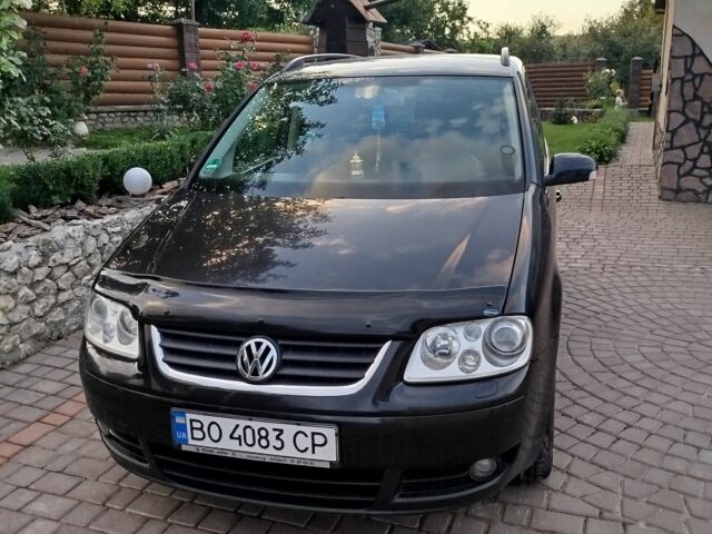 Чорний Фольксваген Туран, об'ємом двигуна 1.6 л та пробігом 168 тис. км за 5500 $, фото 1 на Automoto.ua