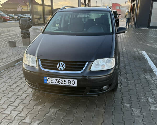 Чорний Фольксваген Туран, об'ємом двигуна 1.97 л та пробігом 388 тис. км за 4900 $, фото 1 на Automoto.ua