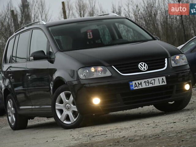 Чорний Фольксваген Туран, об'ємом двигуна 2 л та пробігом 267 тис. км за 5999 $, фото 1 на Automoto.ua