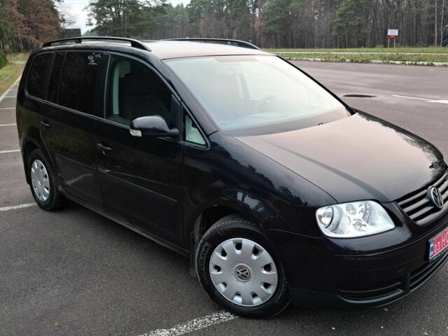 Чорний Фольксваген Туран, об'ємом двигуна 1.6 л та пробігом 240 тис. км за 5700 $, фото 1 на Automoto.ua