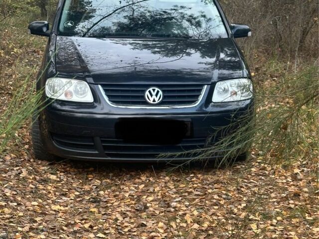 Чорний Фольксваген Туран, об'ємом двигуна 2 л та пробігом 300 тис. км за 2500 $, фото 1 на Automoto.ua