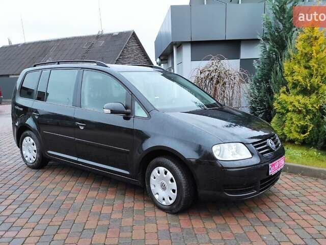 Черный Фольксваген Туран, объемом двигателя 1.6 л и пробегом 237 тыс. км за 5200 $, фото 1 на Automoto.ua