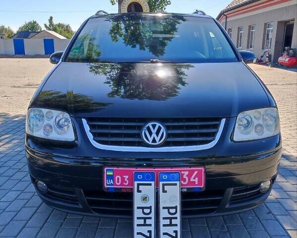 Чорний Фольксваген Туран, об'ємом двигуна 1.6 л та пробігом 190 тис. км за 5500 $, фото 1 на Automoto.ua