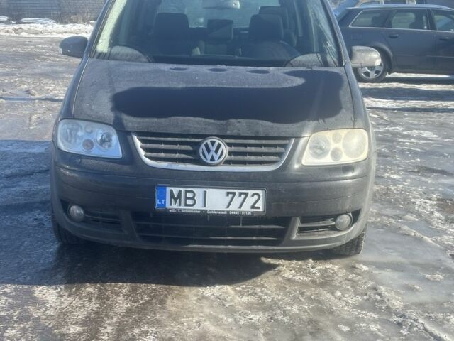 Чорний Фольксваген Туран, об'ємом двигуна 2 л та пробігом 272 тис. км за 2750 $, фото 1 на Automoto.ua