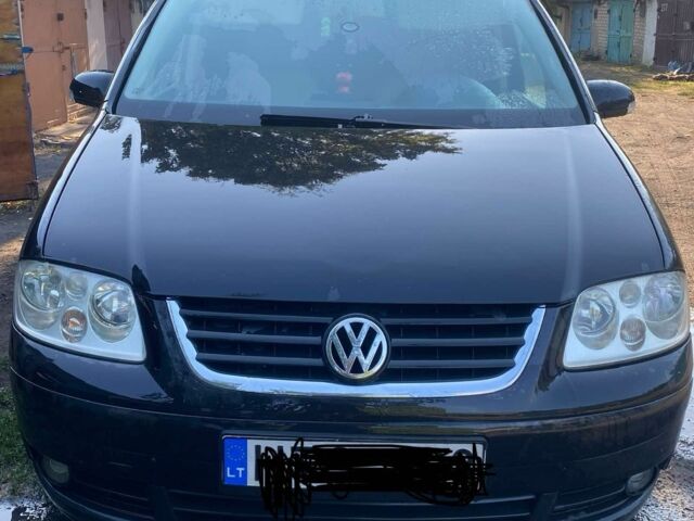 Чорний Фольксваген Туран, об'ємом двигуна 2 л та пробігом 310 тис. км за 3200 $, фото 1 на Automoto.ua