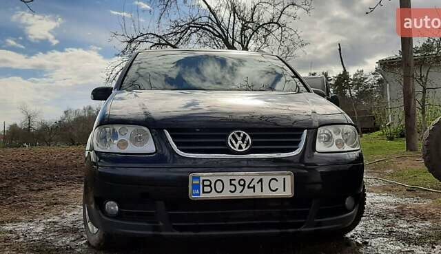 Черный Фольксваген Туран, объемом двигателя 1.9 л и пробегом 280 тыс. км за 6500 $, фото 1 на Automoto.ua