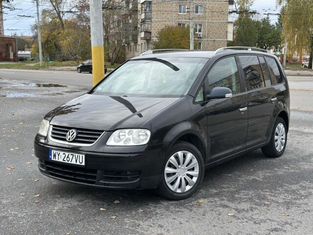 Фольксваген Туран 2005 в Харькове на Automoto.ua Черный Фольксваген Туран, объемом двигателя 0 л и пробегом 123 тыс. км за 2700 $, фото 1 на Automoto.ua