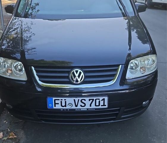 Черный Фольксваген Туран, объемом двигателя 0 л и пробегом 230 тыс. км за 3799 $, фото 1 на Automoto.ua