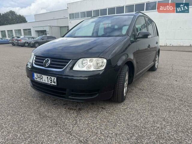 Фольксваген Туран 2005 в Житомире на Automoto.ua Черный Фольксваген Туран, объемом двигателя 1.6 л и пробегом 186 тыс. км за 6950 $, фото 1 на Automoto.ua