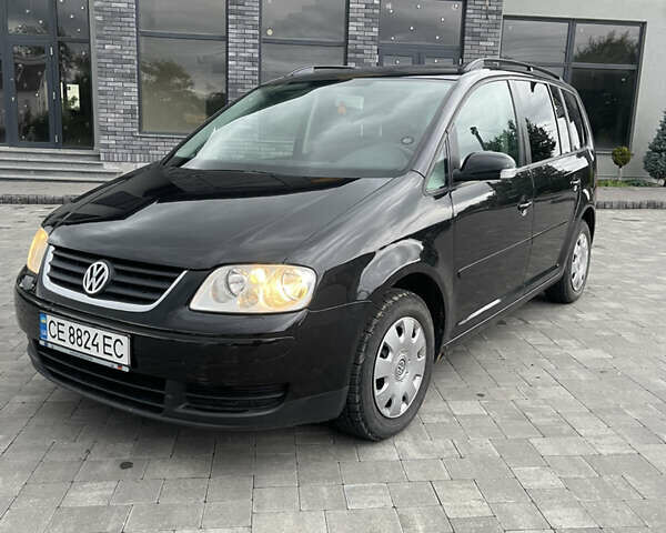 Черный Фольксваген Туран, объемом двигателя 1.9 л и пробегом 284 тыс. км за 6500 $, фото 1 на Automoto.ua