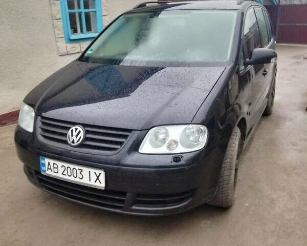 Чорний Фольксваген Туран, об'ємом двигуна 1.6 л та пробігом 172 тис. км за 6900 $, фото 1 на Automoto.ua