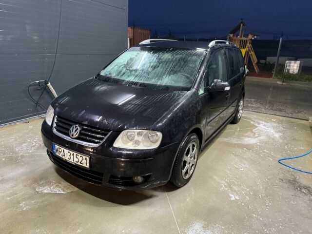 Черный Фольксваген Туран, объемом двигателя 1.9 л и пробегом 300 тыс. км за 2700 $, фото 1 на Automoto.ua