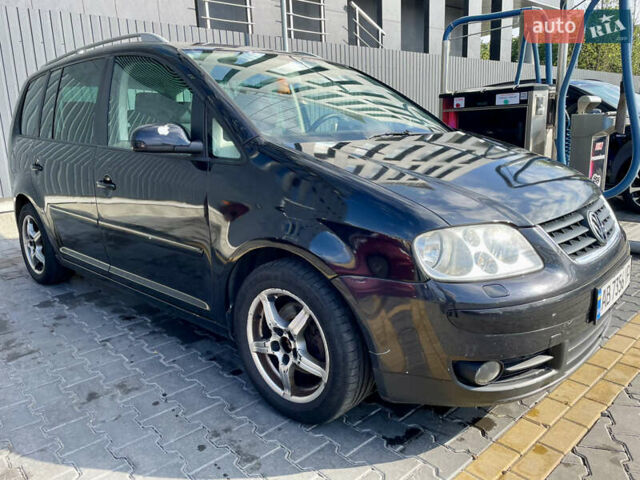 Черный Фольксваген Туран, объемом двигателя 2 л и пробегом 368 тыс. км за 6200 $, фото 1 на Automoto.ua