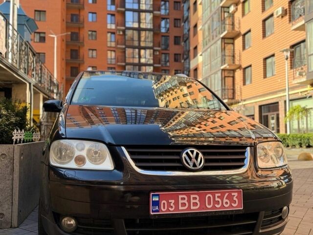 Черный Фольксваген Туран, объемом двигателя 1.6 л и пробегом 190 тыс. км за 6700 $, фото 1 на Automoto.ua