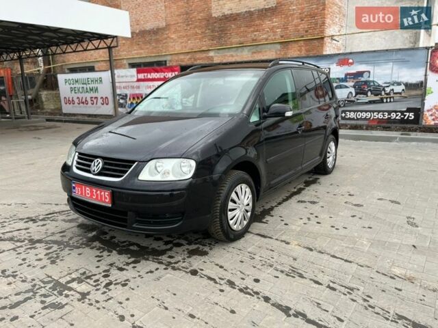 Чорний Фольксваген Туран, об'ємом двигуна 1.6 л та пробігом 249 тис. км за 5699 $, фото 1 на Automoto.ua