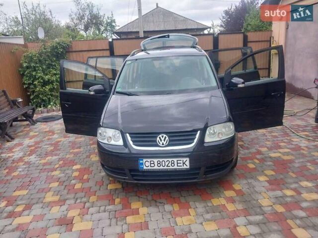 Черный Фольксваген Туран, объемом двигателя 1.6 л и пробегом 277 тыс. км за 6200 $, фото 1 на Automoto.ua