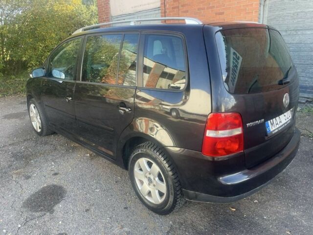 Чорний Фольксваген Туран, об'ємом двигуна 2 л та пробігом 1 тис. км за 3200 $, фото 1 на Automoto.ua