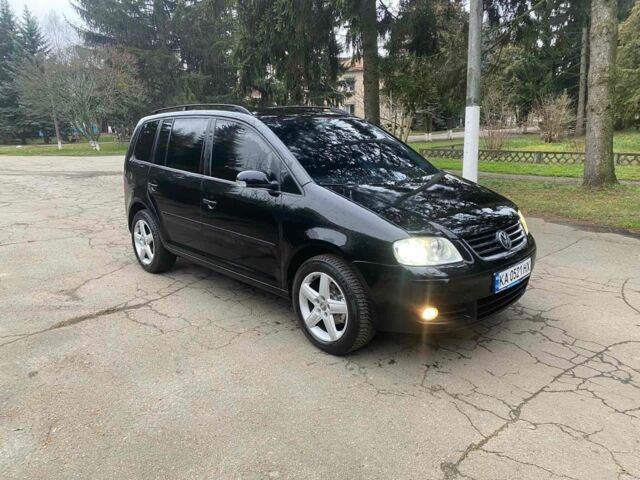 Чорний Фольксваген Туран, об'ємом двигуна 1.9 л та пробігом 290 тис. км за 6500 $, фото 1 на Automoto.ua