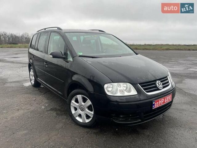 Чорний Фольксваген Туран, об'ємом двигуна 1.6 л та пробігом 205 тис. км за 6500 $, фото 1 на Automoto.ua