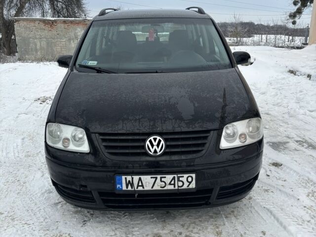 Черный Фольксваген Туран, объемом двигателя 1.9 л и пробегом 350 тыс. км за 2800 $, фото 1 на Automoto.ua