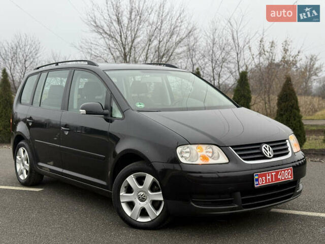Чорний Фольксваген Туран, об'ємом двигуна 1.6 л та пробігом 220 тис. км за 6200 $, фото 1 на Automoto.ua