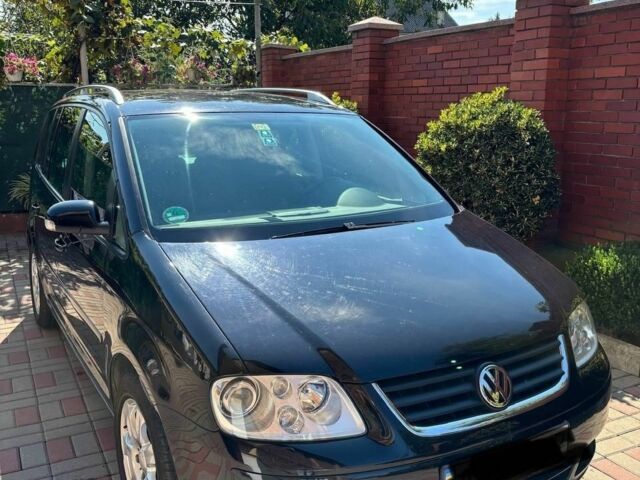 Черный Фольксваген Туран, объемом двигателя 0 л и пробегом 300 тыс. км за 6700 $, фото 1 на Automoto.ua