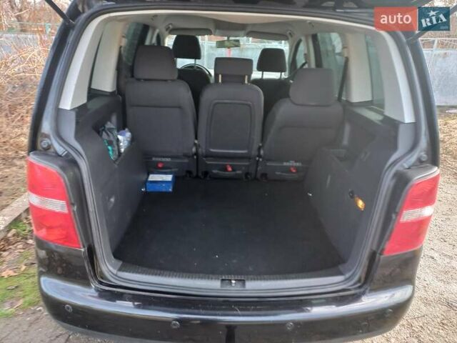 Чорний Фольксваген Туран, об'ємом двигуна 1.4 л та пробігом 217 тис. км за 5850 $, фото 1 на Automoto.ua