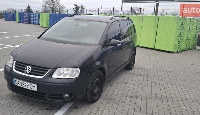 Чорний Фольксваген Туран, об'ємом двигуна 2 л та пробігом 485 тис. км за 4300 $, фото 1 на Automoto.ua