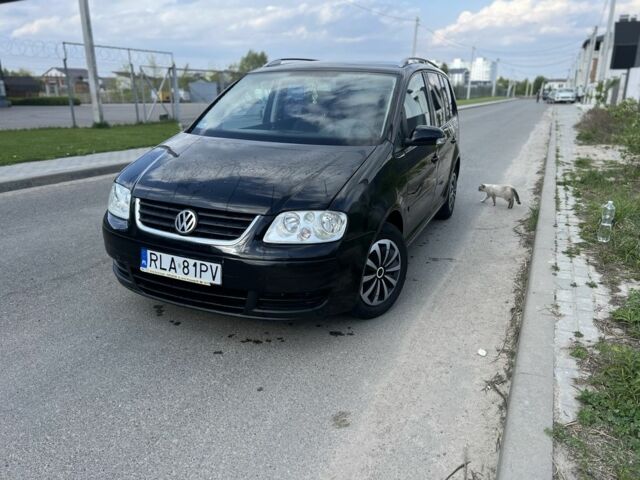 Черный Фольксваген Туран, объемом двигателя 1.9 л и пробегом 250 тыс. км за 3600 $, фото 1 на Automoto.ua