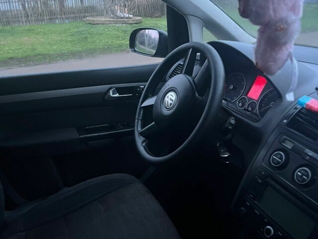 Черный Фольксваген Туран, объемом двигателя 2 л и пробегом 5 тыс. км за 1977 $, фото 1 на Automoto.ua