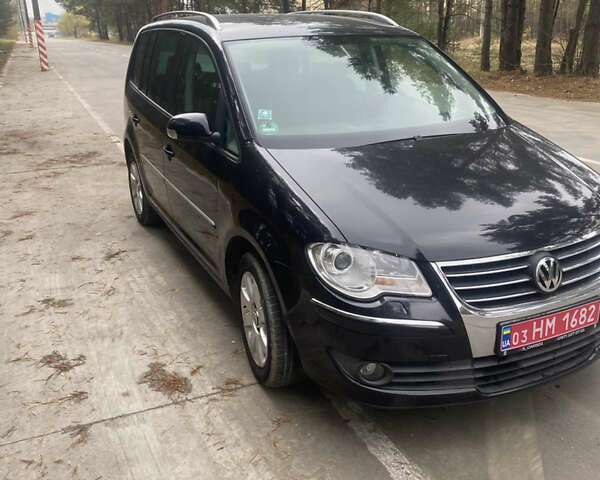 Чорний Фольксваген Туран, об'ємом двигуна 1.39 л та пробігом 187 тис. км за 6500 $, фото 1 на Automoto.ua