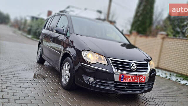 Черный Фольксваген Туран, объемом двигателя 1.4 л и пробегом 193 тыс. км за 6950 $, фото 1 на Automoto.ua