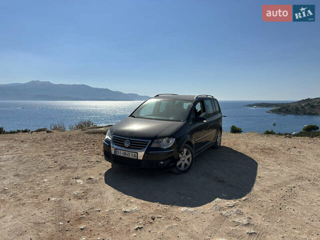 Чорний Фольксваген Туран, об'ємом двигуна 1.97 л та пробігом 270 тис. км за 8300 $, фото 1 на Automoto.ua