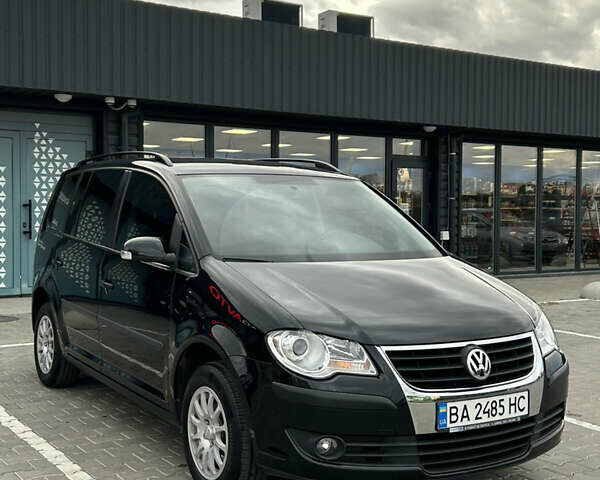 Чорний Фольксваген Туран, об'ємом двигуна 1.9 л та пробігом 124 тис. км за 8700 $, фото 1 на Automoto.ua