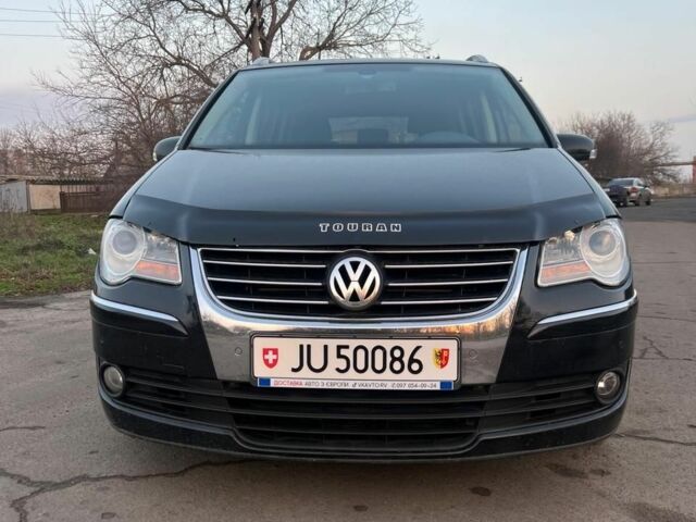 Черный Фольксваген Туран, объемом двигателя 0 л и пробегом 230 тыс. км за 4999 $, фото 1 на Automoto.ua