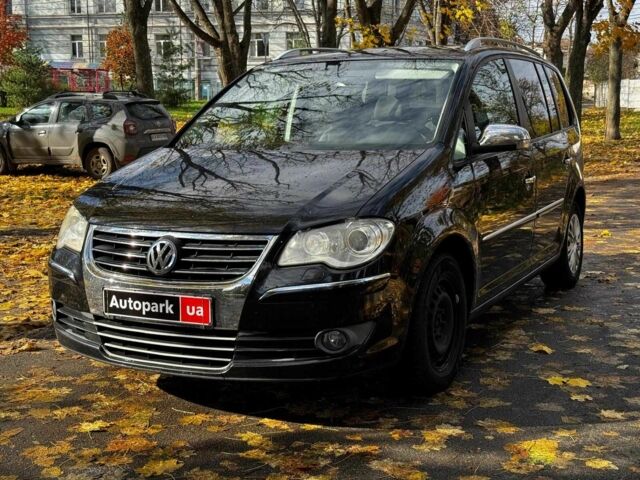 Чорний Фольксваген Туран, об'ємом двигуна 1.4 л та пробігом 242 тис. км за 6390 $, фото 1 на Automoto.ua