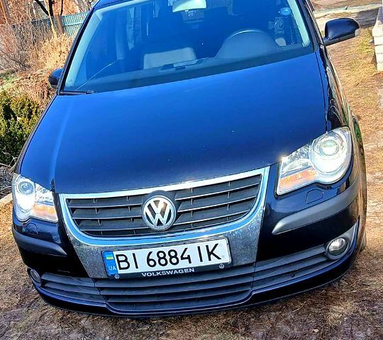 Чорний Фольксваген Туран, об'ємом двигуна 1.4 л та пробігом 350 тис. км за 5200 $, фото 1 на Automoto.ua