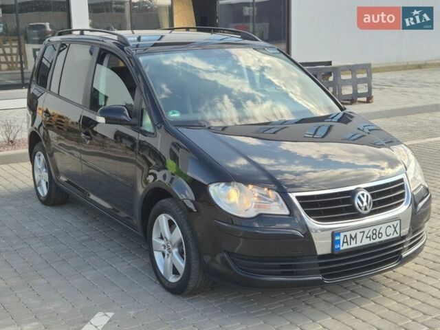 Черный Фольксваген Туран, объемом двигателя 1.4 л и пробегом 232 тыс. км за 6999 $, фото 1 на Automoto.ua
