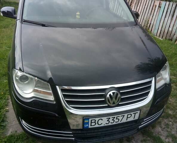 Черный Фольксваген Туран, объемом двигателя 1.9 л и пробегом 305 тыс. км за 6000 $, фото 1 на Automoto.ua