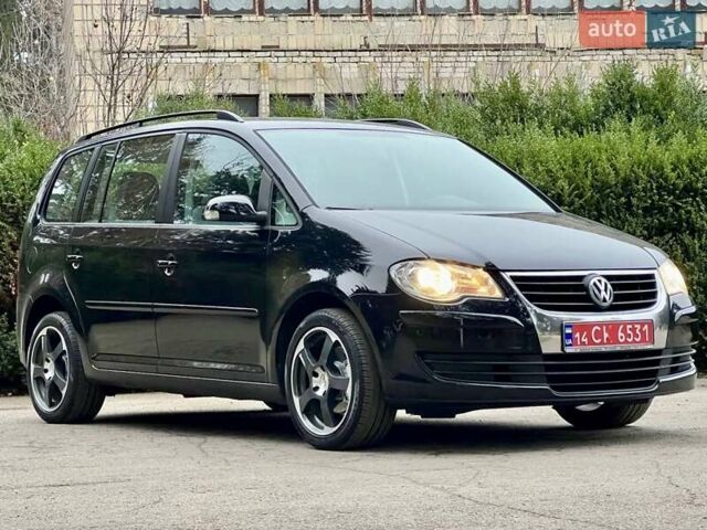 Чорний Фольксваген Туран, об'ємом двигуна 1.6 л та пробігом 221 тис. км за 7750 $, фото 1 на Automoto.ua