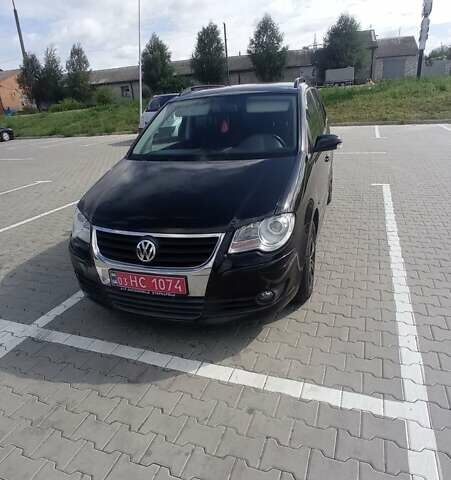 Чорний Фольксваген Туран, об'ємом двигуна 1.4 л та пробігом 216 тис. км за 7800 $, фото 1 на Automoto.ua