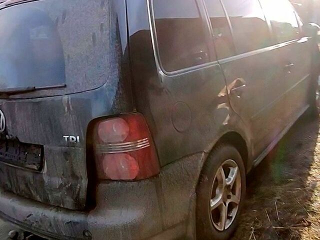 Черный Фольксваген Туран, объемом двигателя 1.9 л и пробегом 269 тыс. км за 3000 $, фото 1 на Automoto.ua