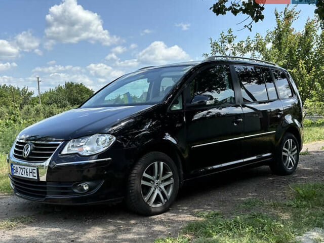 Черный Фольксваген Туран, объемом двигателя 1.39 л и пробегом 191 тыс. км за 8500 $, фото 1 на Automoto.ua