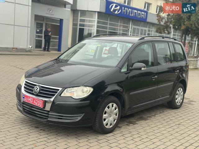 Чорний Фольксваген Туран, об'ємом двигуна 1.6 л та пробігом 260 тис. км за 6299 $, фото 1 на Automoto.ua