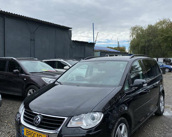 Черный Фольксваген Туран, объемом двигателя 1.6 л и пробегом 185 тыс. км за 8200 $, фото 1 на Automoto.ua