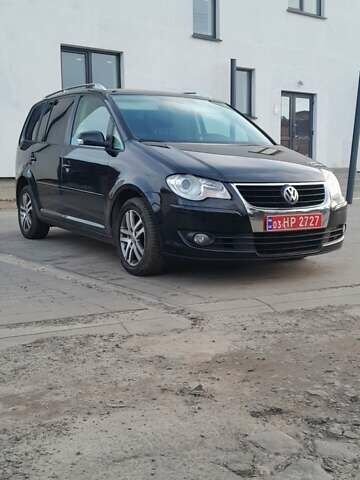 Чорний Фольксваген Туран, об'ємом двигуна 1.4 л та пробігом 212 тис. км за 6200 $, фото 1 на Automoto.ua
