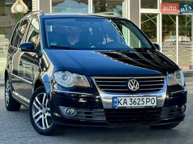 Чорний Фольксваген Туран, об'ємом двигуна 1.4 л та пробігом 269 тис. км за 7250 $, фото 1 на Automoto.ua