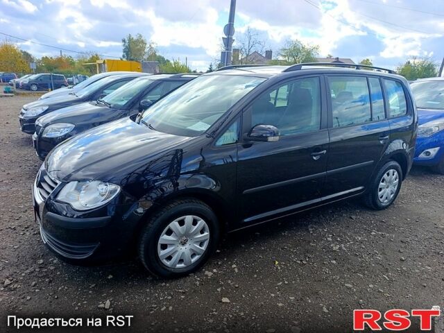 Чорний Фольксваген Туран, об'ємом двигуна 1.6 л та пробігом 217 тис. км за 7200 $, фото 1 на Automoto.ua