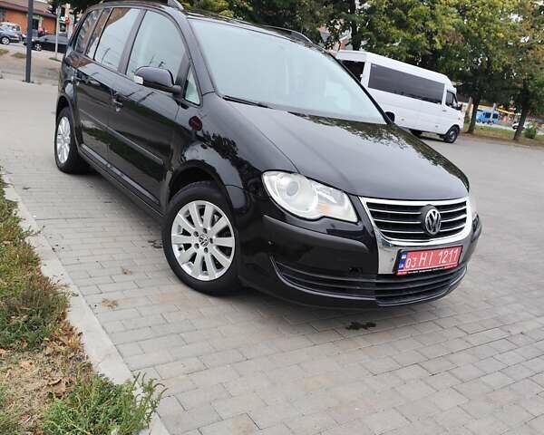 Чорний Фольксваген Туран, об'ємом двигуна 1.4 л та пробігом 194 тис. км за 6600 $, фото 1 на Automoto.ua